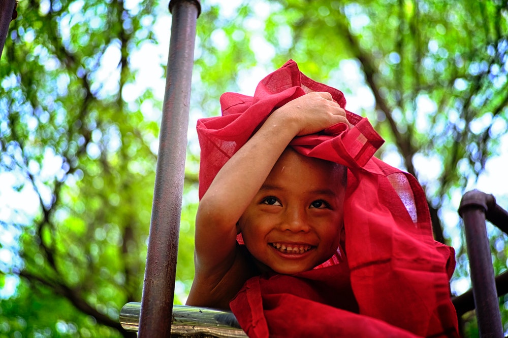 Bambino che sorride – foto di Min Thein